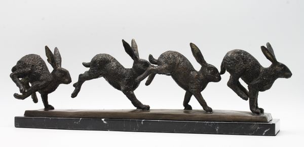 Running Rabbits Bronze 17cm high by 54cm wide by 12cm deep