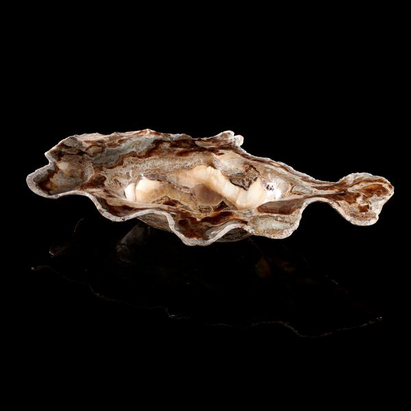 A large and unusual polished onyx bowl Mexico 85cm by 53cm