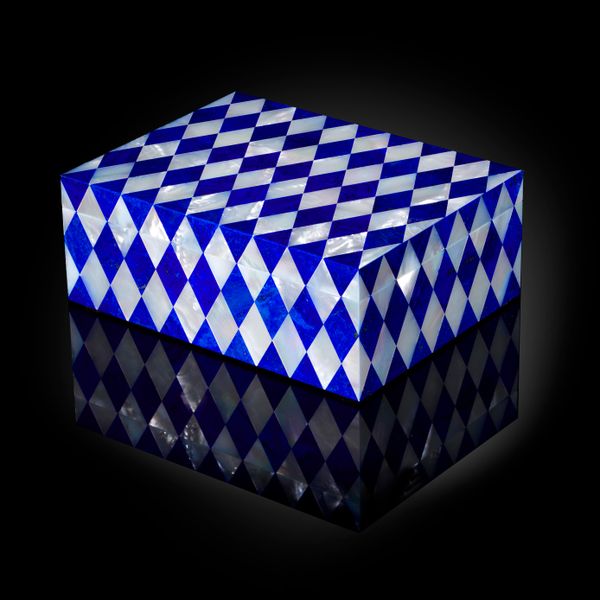 A superb lapis lazuli and mother of pearl veneered box 18cm by 14cm