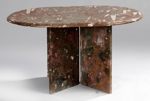 A rounded rectangular fossil marble table with orthoceras and ammonite specimens Moroccan, Devonian 84cm long