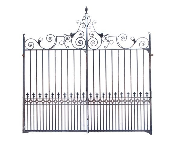 A pair of substantial Georgian style gates 20th century 370cm high by 380cm wide, together with two wrought and cast iron pier crestings, 60cm high...