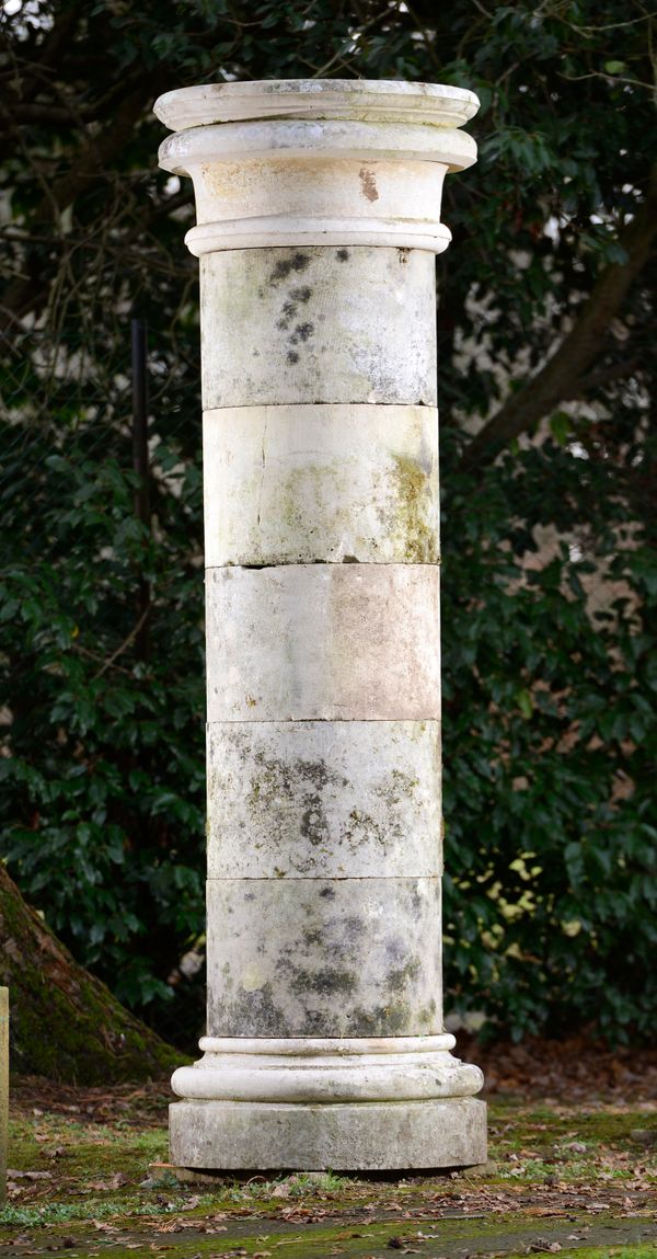 † A substantial carved Portland stone column 19th century 222cm high