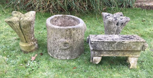 A pair of carved stone finials 32cm high, together with a carved limestone stool, French 19th century, 40cm long, and  and a composition stone tree...
