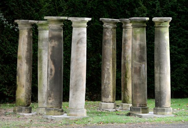 A pair of carved sandstone column pedestals late 19th century 163cm high
