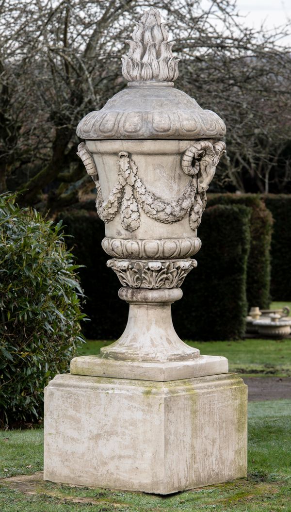 A substantial composition stone finial on pedestal late 20th century 230cm high