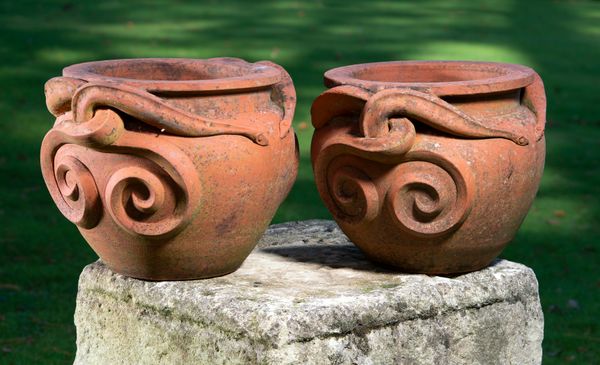 A pair of Compton style terracotta snake pots last quarter 20th century stamped Meon 33cm high