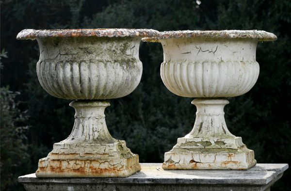 A pair of cast iron urns 2nd half 19th century 53cm high