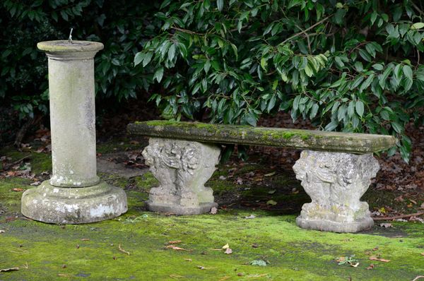 A composition stone bench 2nd half 20th century 145cm wide, together with a fireclay sundial, early 20th century, 96cm high