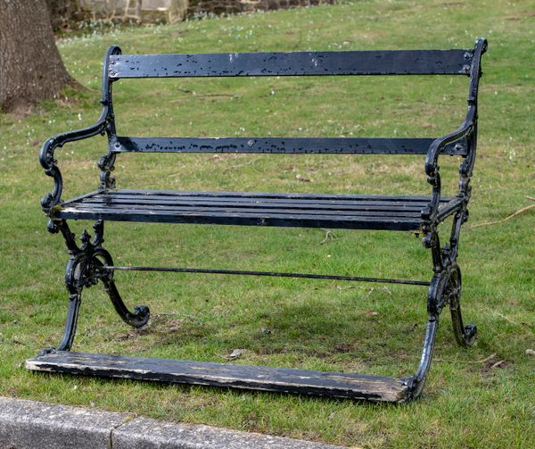 A rare cast iron seat with foot rail 2nd half 19th century 135cm wide 19th Century cast iron seats very rarely incorporate a foot rest, which in...