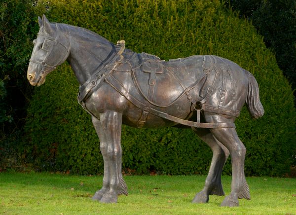 A life size bronze figure of a dray horse 210cm high by 290cm long Provenance: Removed from Camden Lock Market due to redevelopment see our website...