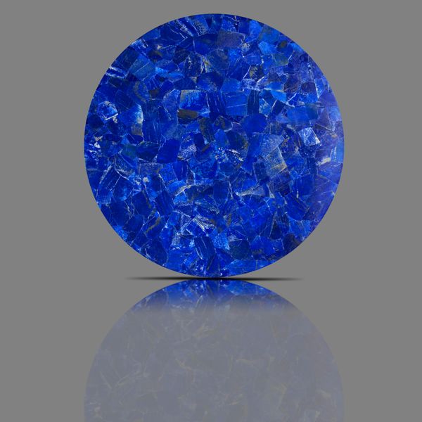 A large lapis lazuli veneered table 122cm diameter on wooden base