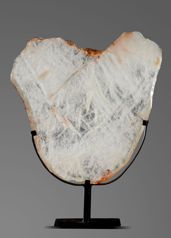 A quartz slice on metal stand 58cm high