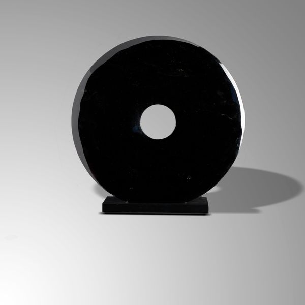 A large obsidian disk  Mexico  51cm diameter