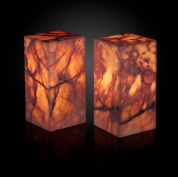 A pair of pink onyx lamps 30cm high