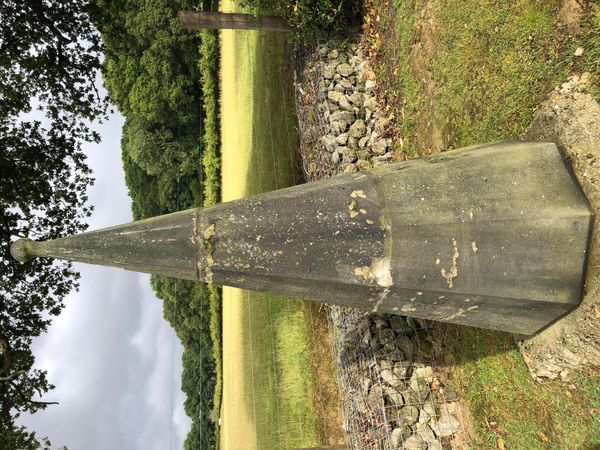 A pair of Victorian carved sandstone hexagonal obelisks circa 1860 200cm high From the personal collection of Tim Wonnacott.  See lot 400 for...
