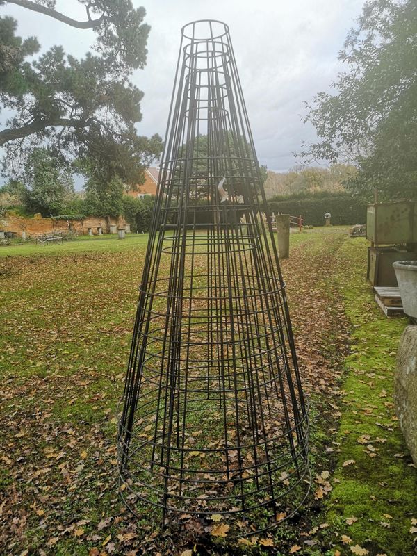 A set of six wrought iron conical treillage frames modern 206cm high From the personal collection of Tim Wonnacott.  See lot 400 for further...