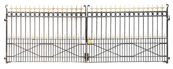 A pair of substantial cast and wrought iron gates  early 20th century  192cm high by 552cm wide