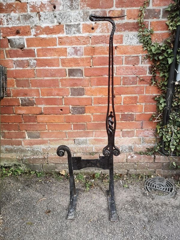 An unusual wrought iron boot scraper late 19th/early 20th century 124cm high