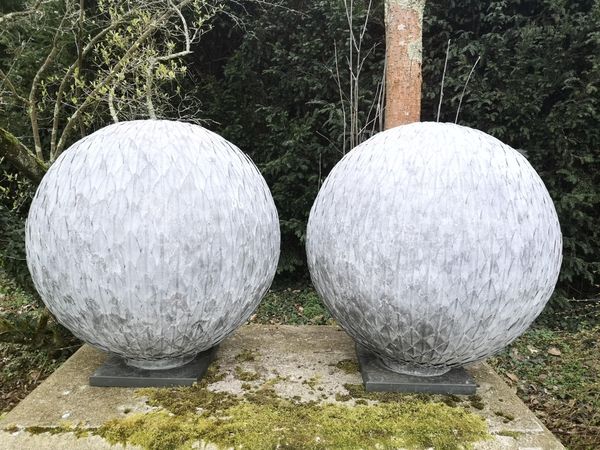 A pair of zinc coated steel leaf balls modern 75cm high