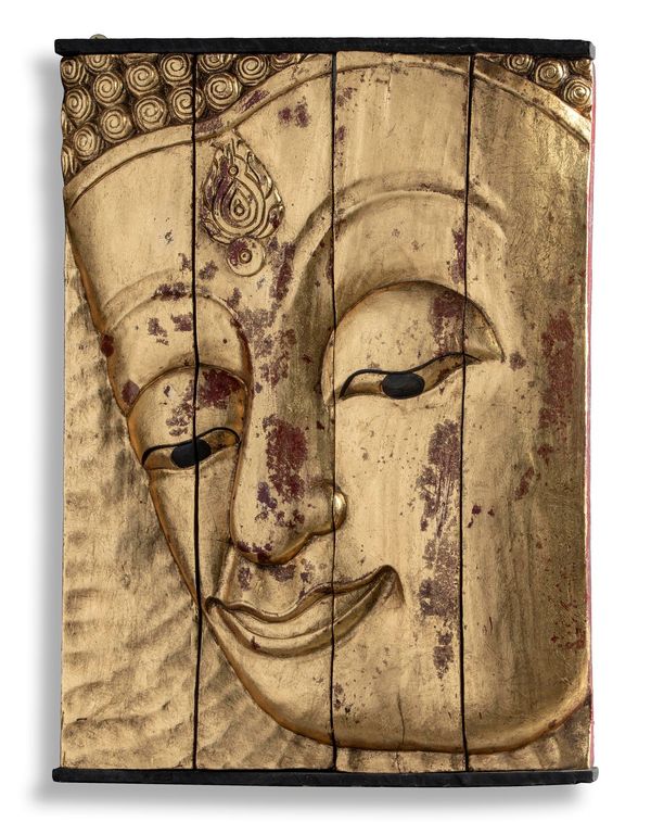 A giltwood panel of a Buddha‘s head Siamese, 20th century 80cm high by 59cm wide