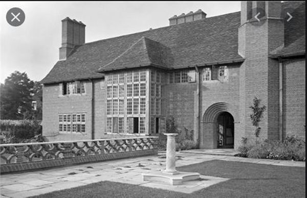 The carved stone and brick components from a wall designed by Sir Edwin Lutyens and removed from the Deanery, Sonning comprising 12 limestone pier...