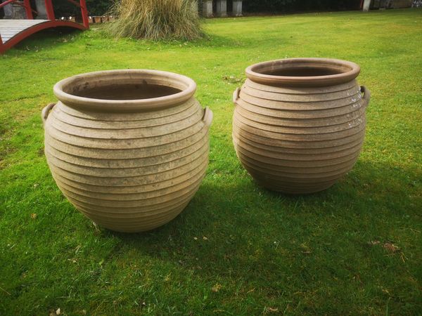 A pair of Hode Pottery Greek Pithos style clay planters modern inscribed Hode Pottery 57cm high