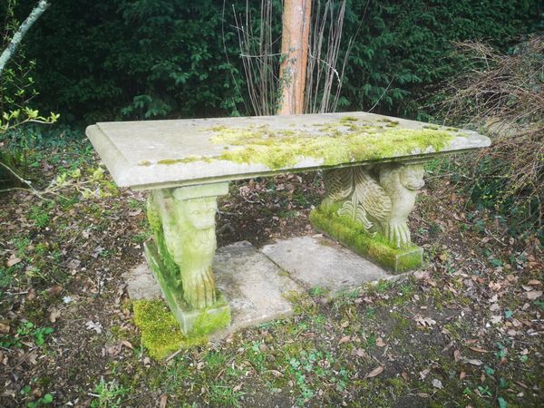 † A carved sandstone bench or low table