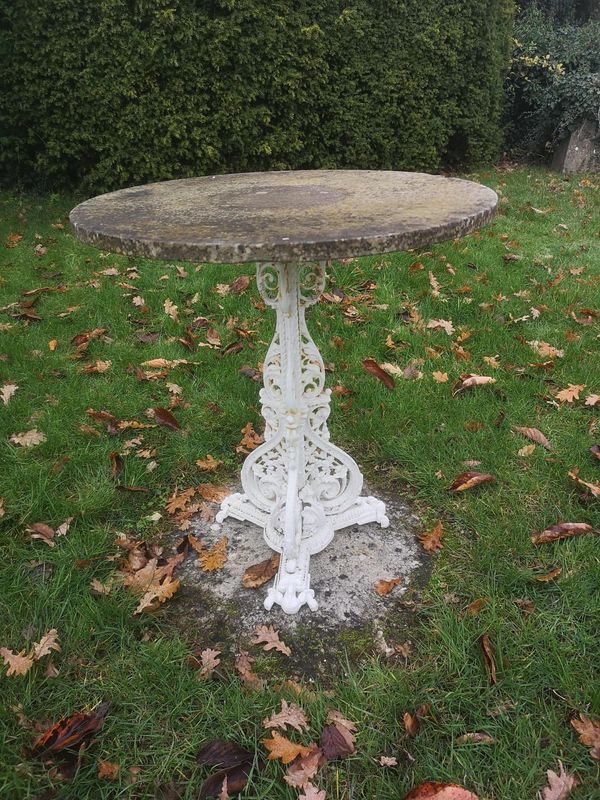 A Victorian cast iron table late 19th century with circular marble top 69cm diameter