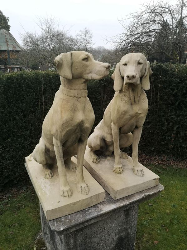 After Jacquemart: A pair of composition stone dogs  modern 80cm high This model after Alfred Jacquemart was originally produced by the Barbezat...