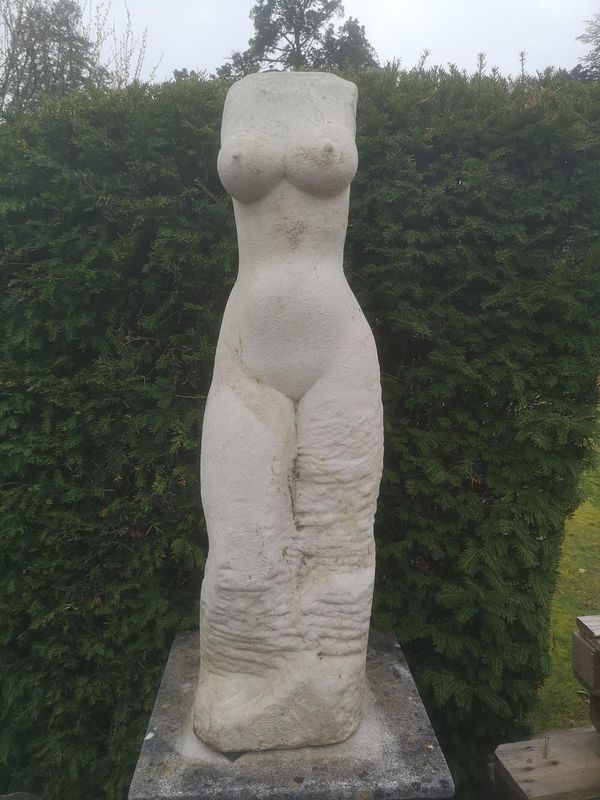 A carved Portland stone female torso mid 20th century 105cm high From the estate of the late Rita Smith. TV Comedy actress from the late 50‘s and...