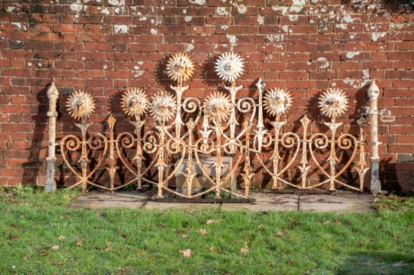 A quantity of unusual cast iron sunflower railing 2nd half 19th century 86cm high by approximately 11 metres long, together with two cast iron...