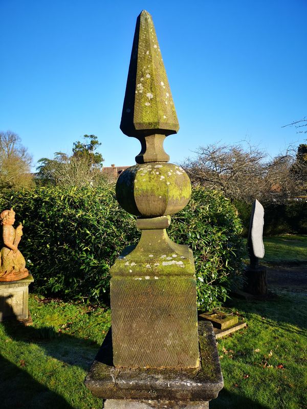 A Victorian carved stone obelisk finial circa 1860 137cm high