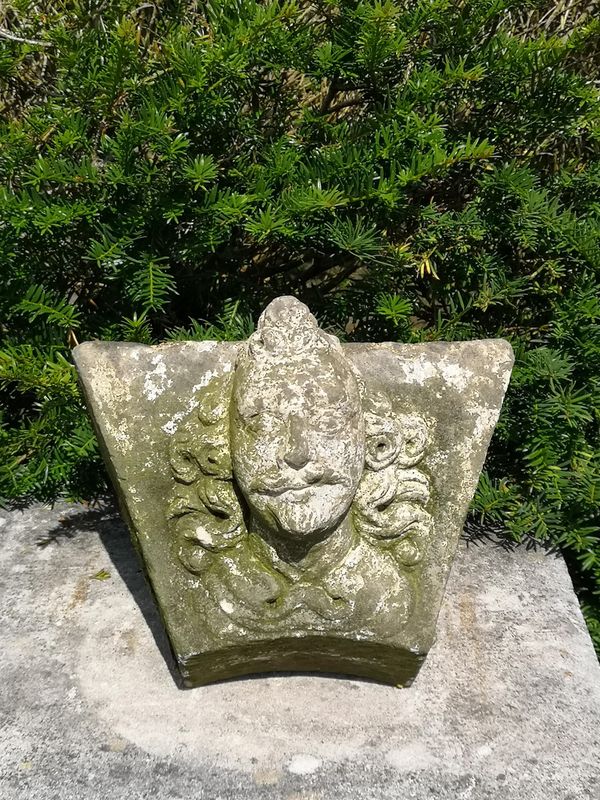 An unusual carved stone keystone of moustachioed man Low Countries, late 17th/early 18th century 18cm high by 28.5cm wide