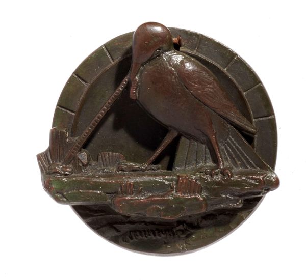 A similar but unsigned bronze door knocker of a bird pulling a worm  1930s 9.5cm high by 10cm wide