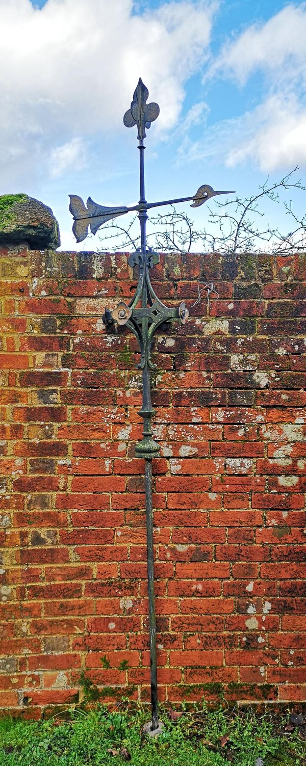 A Victorian cast iron weathervane circa 1870 lacking direction indicators 260cm high