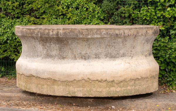 A monumental oval composition stone trough French, mid 20th century 101cm high by 240cm long by 163cm deep