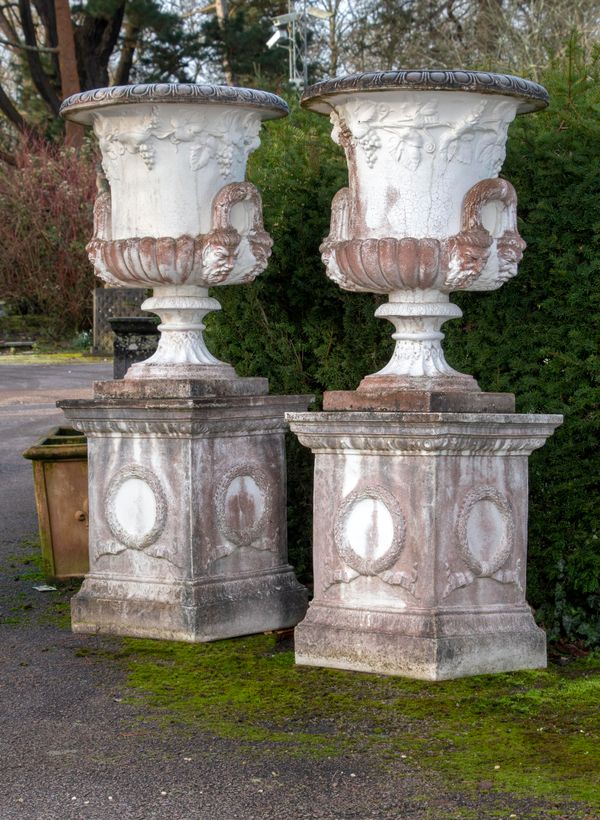 A pair of composition stone urns on pedestals 2nd half 20th century 168cm high