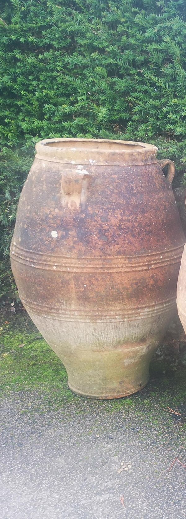 A terracotta oil storage jar Southern Mediterranean, 19th/20th century 100cm high