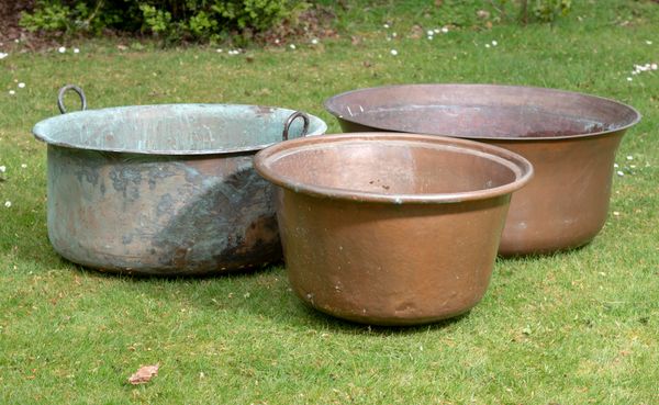 Three washing coppers including one with handles  the largest 83cm diameter