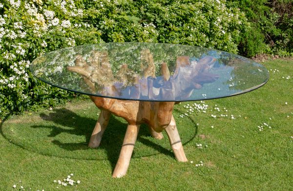 A root wood table with glass top  180cm diameter