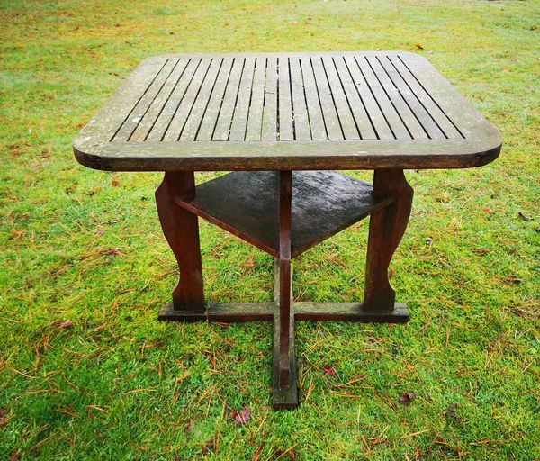 A hardwood ship breaker table early 20th century  with indistinct makers plaque 84cm square