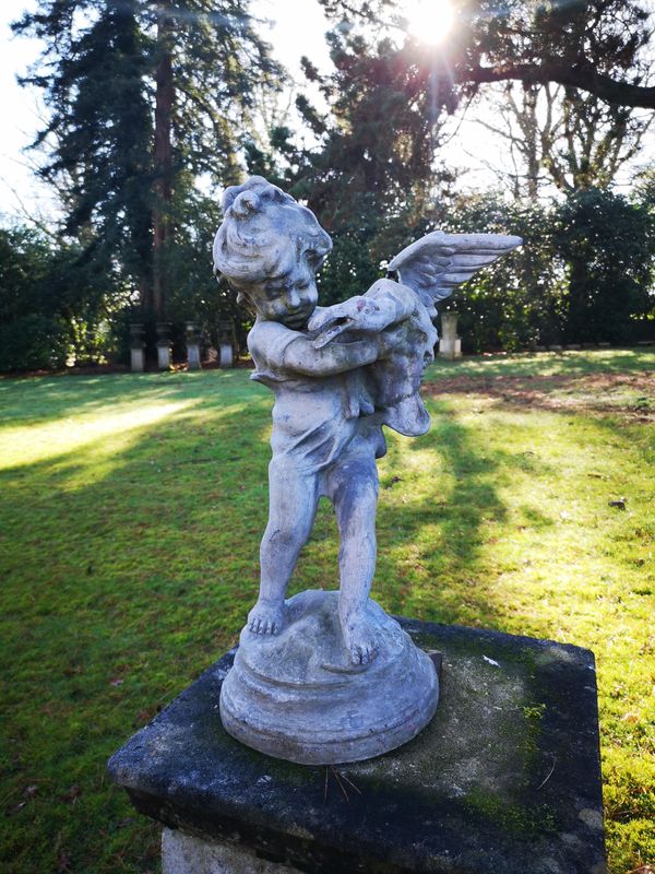 A lead fountain figure of a girl with a bird 63cm high