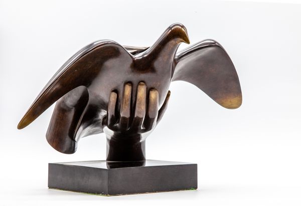 Dove in hands Bronze 30cm high by 49cm wide by 32cm deep