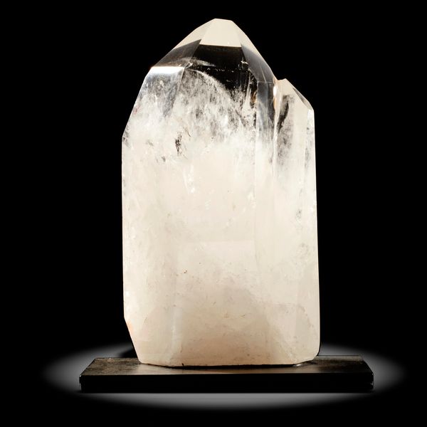 A quartz freeform Madagascar on metal stand  19cm high