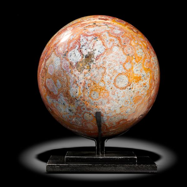 A jasper sphere on metal stand Madagascar 17cm diameter