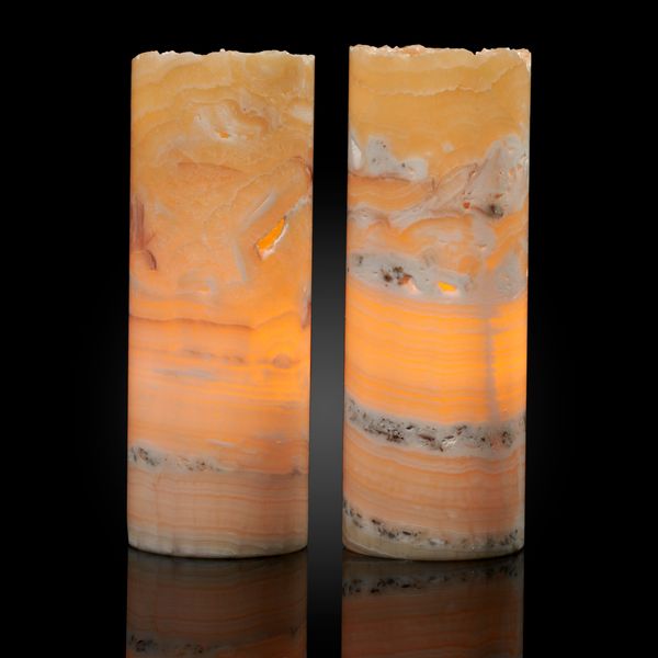 A pair of polished cylindrical onyx lamps Mexico 48cm high