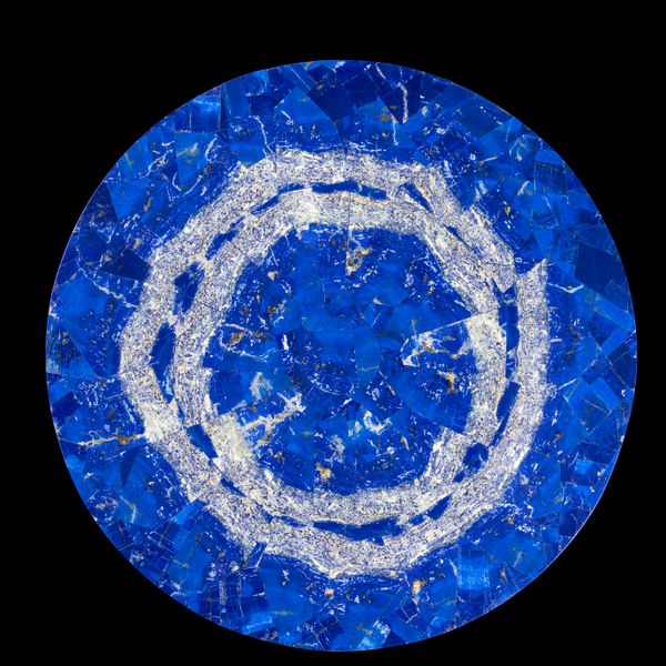 A Madani quality lapis lazuli veneered tabletop 82cm diameter