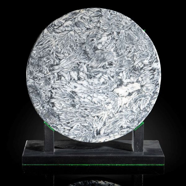 A Pinolite disk Austria 29cm diameter
