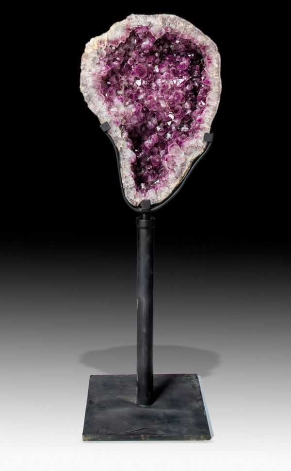 An amethyst freeform on metal stand  Indonesia 28cm diameter