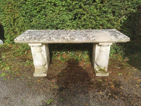 A Portland stone bench (made up) including Edwardian elements 143cm long